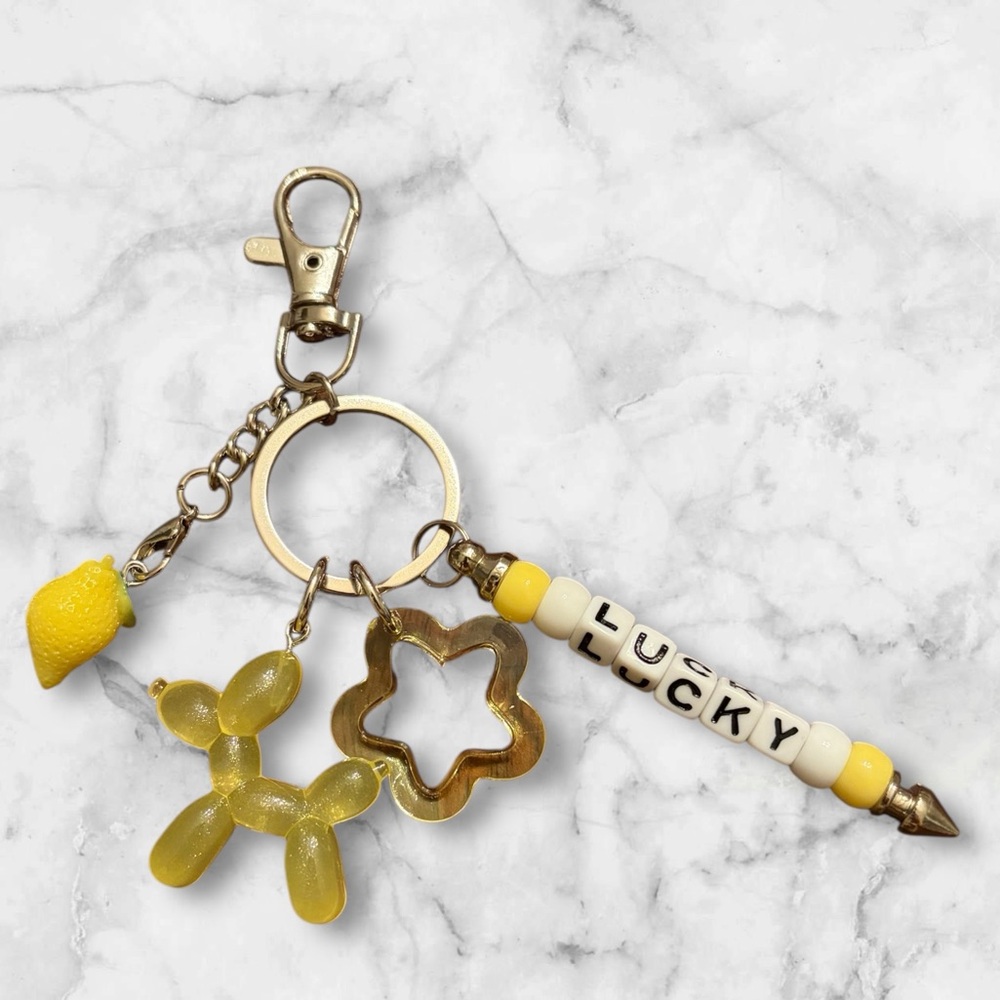 Charming Yellow Beaded Keychain with Fun Charms
